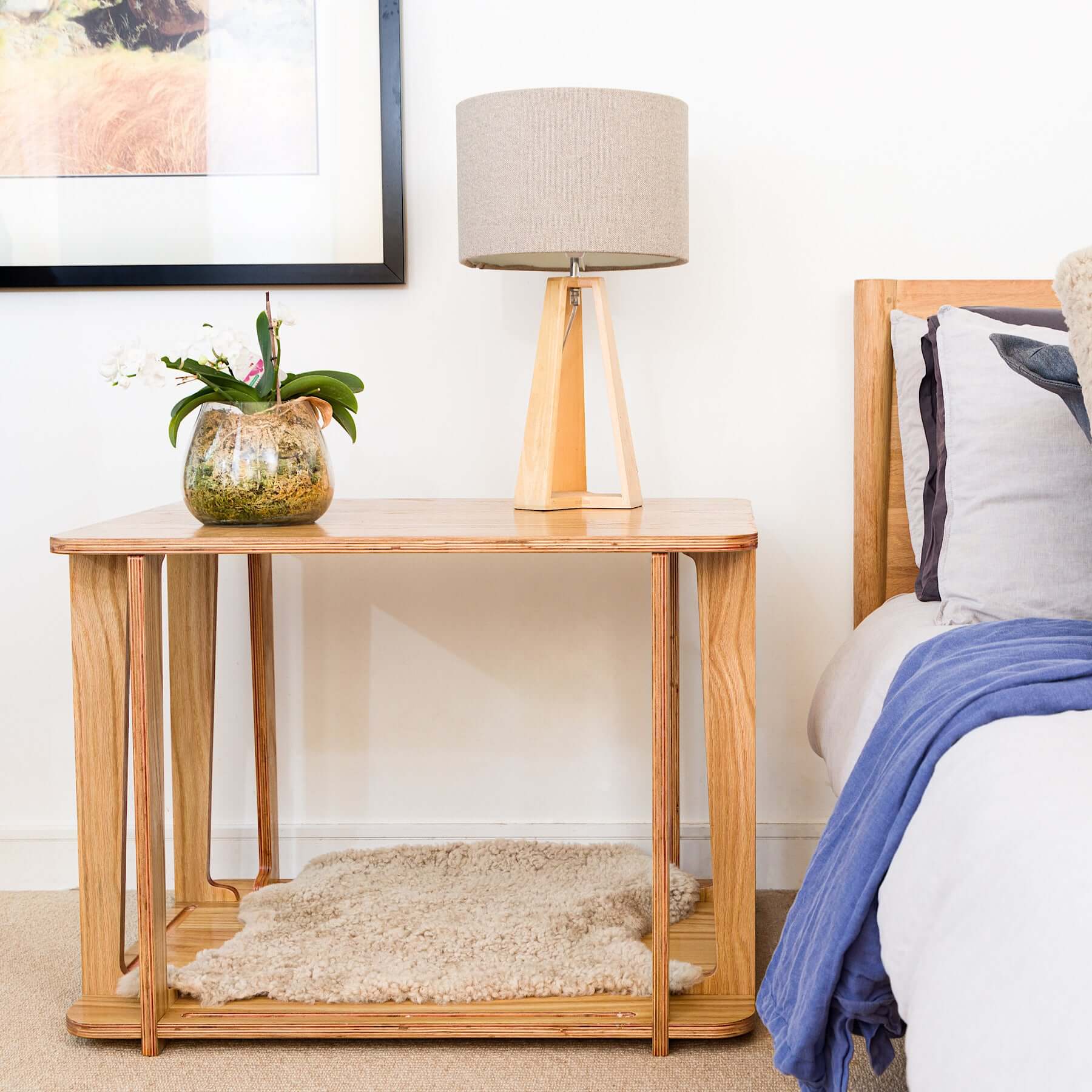 Bedroom scene with Archie the Luxury Dog Crate as a small bedside table with lamp