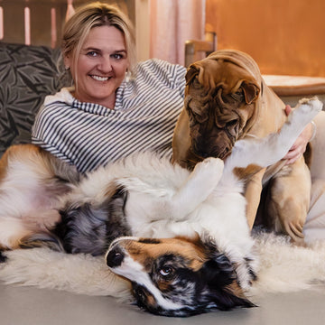 Eliza Kennedy, Co-Founder of The Paws Room with her dogs Mazzy and Paolo