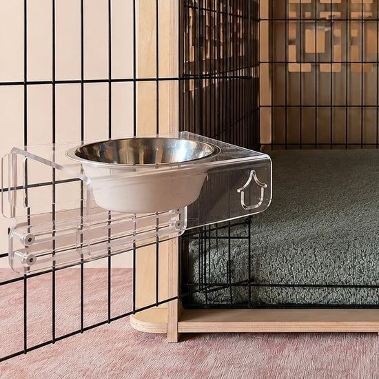 Nook No Tip Crate Bowl Station attached to a black wire pet crate with a Peppa orthopaedic mat