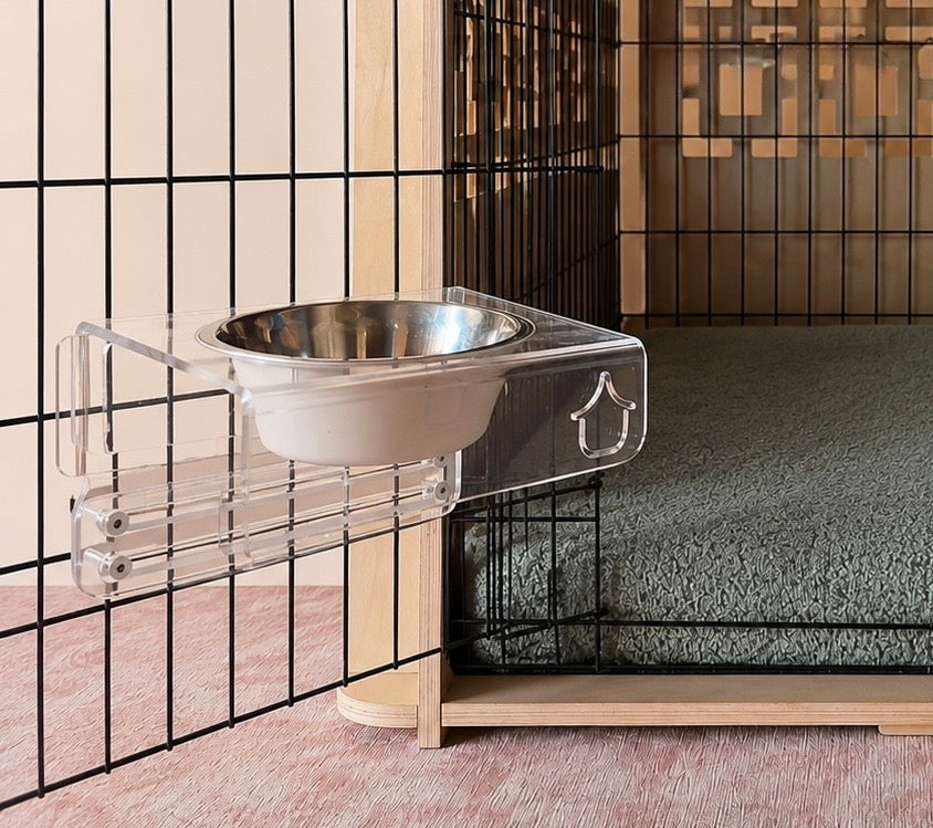 Nook No Tip Crate Bowl Station attached to a black wire pet crate with a Peppa orthopaedic mat