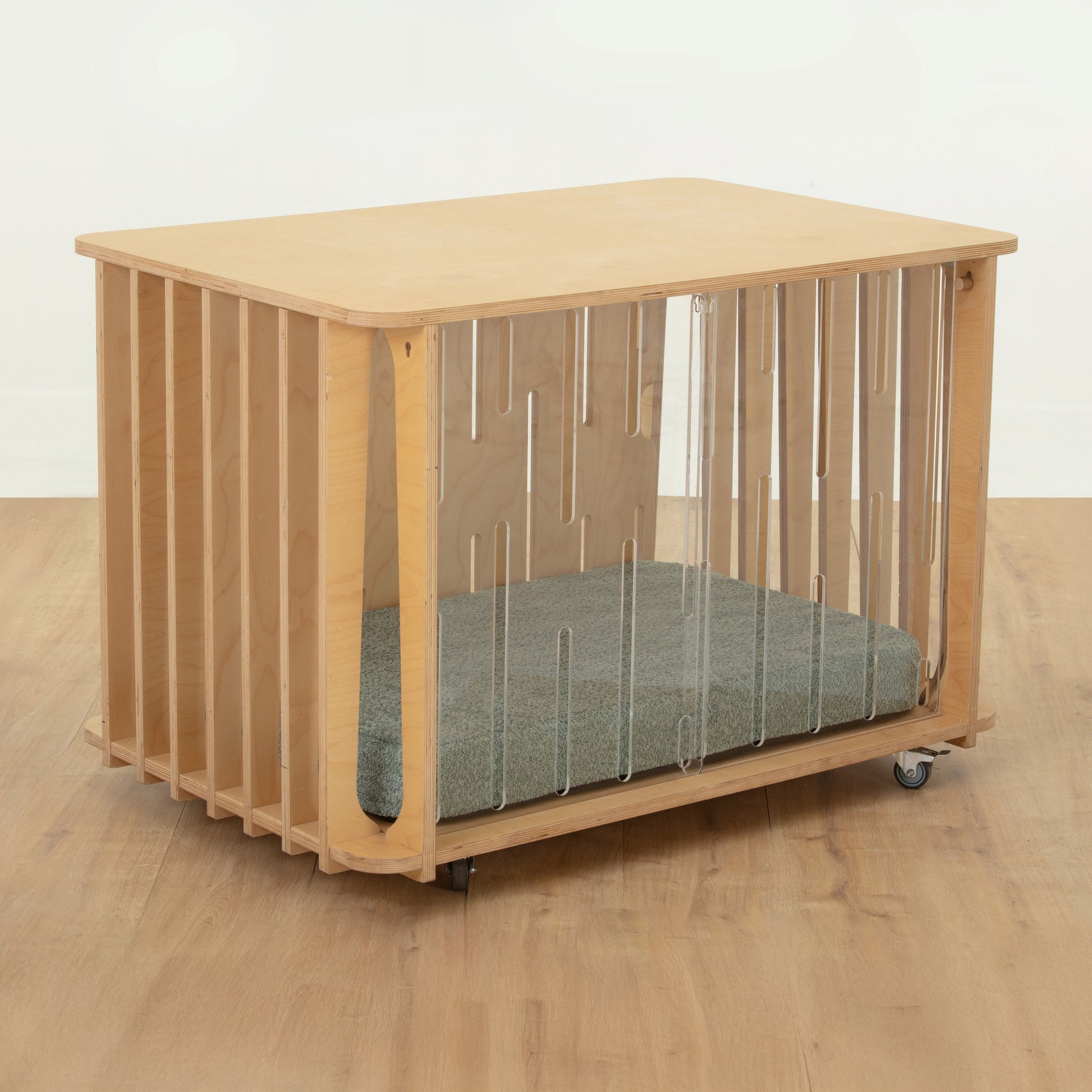 Large Teddy dog crate with sage peppa plump mat and castor wheels | swatch_birch