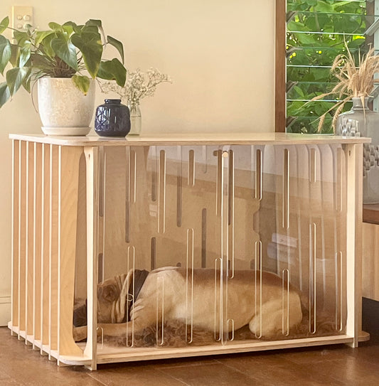 Large Teddy furniture-style dog crate with removable clear acrylic sliding doors and a dog resting peacefully inside.
